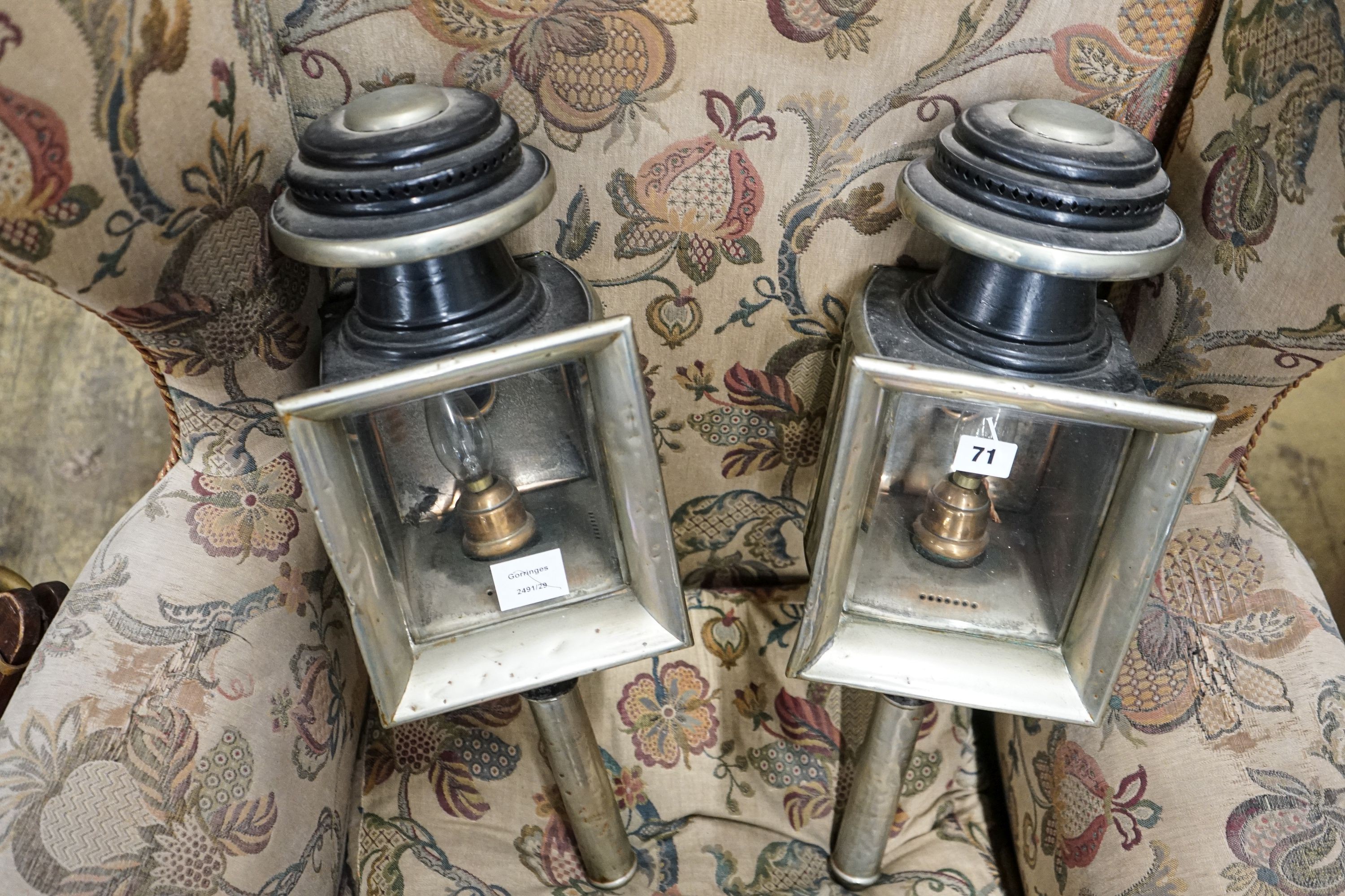 A pair of Victorian painted and polished steel carriage lamps, height 55cm